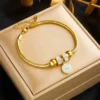 Bracelet à breloques rond en acier inoxydable 316L.