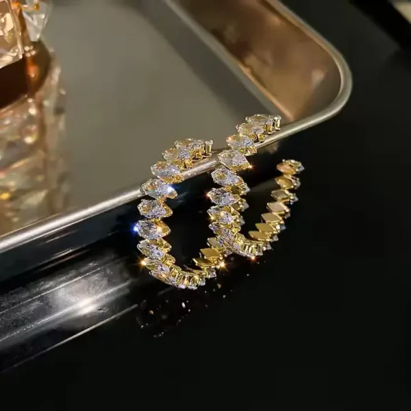 Boucles d'oreilles coréennes en forme de C en argent.